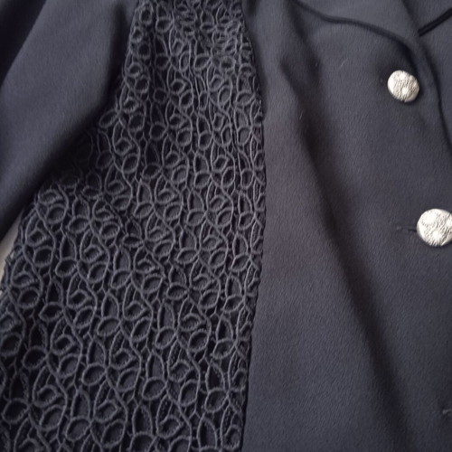 Black suit with guipure lace like new, size 48