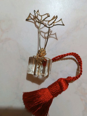 Decorative charm like new