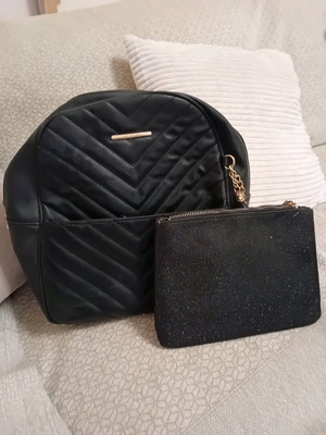 Exclusivo backpack used, in good condition