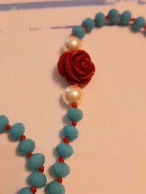 Rosary-style necklace like new with blue beads, roses and pearls