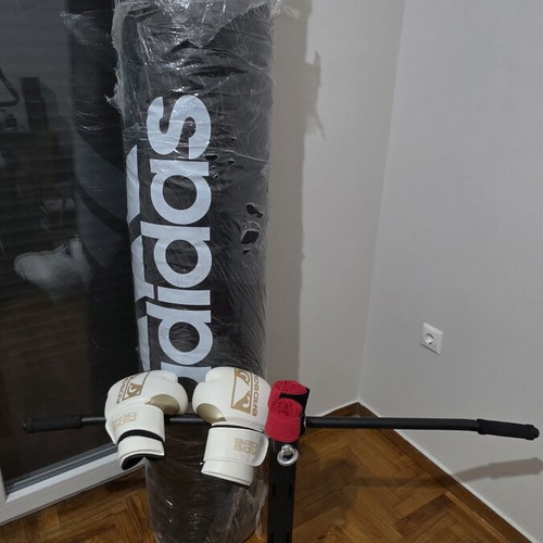 Adidas boxing set new with punching bag, gloves, spring, and wall mount