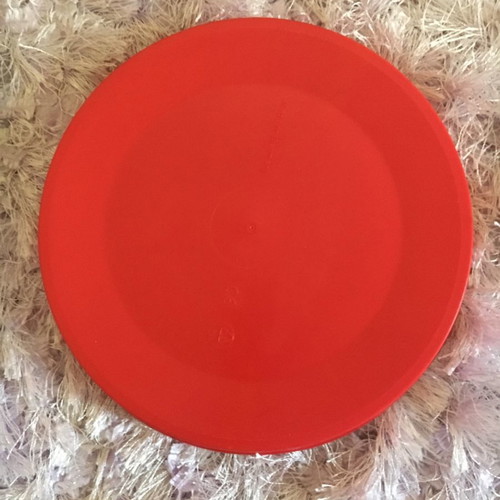 Red frisbee new and unused