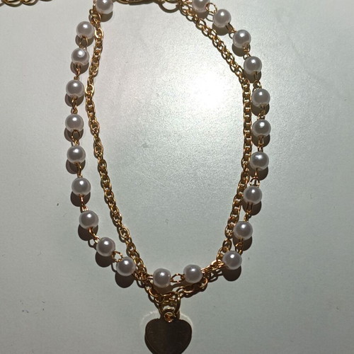 Bracelet new, white and gold-colored