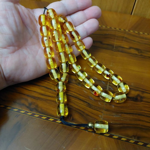 Komboloi made of high-quality resin, new, 33+4 beads amber color