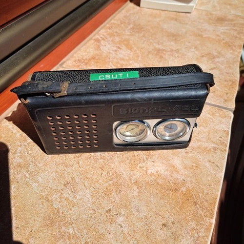 Signal 402 portable Soviet radio with clock used