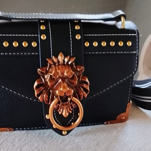 Black shoulder bag with lion design and rose gold details new