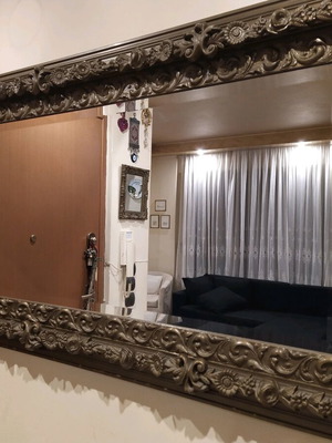 Mirror with carved frame like new, dimensions 1.25x0.75