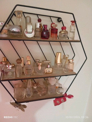 Miniature perfumes used, pack of 83, with display shelves