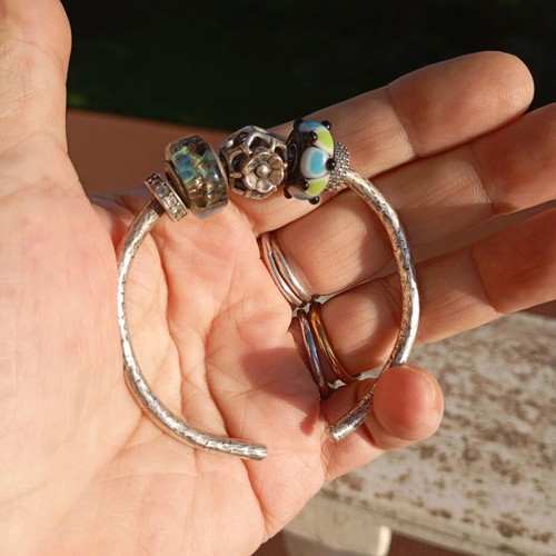 Hammered silver bracelet with Murano charms like new