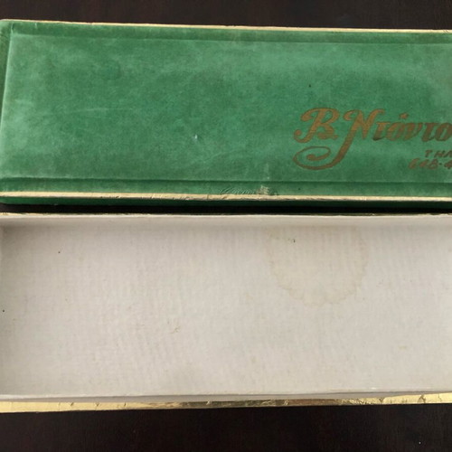Old box used with B. Ntondos logo made of paper and velvet