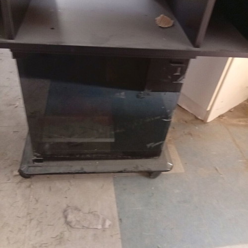 Modern black TV stand with two shelves and glass like new