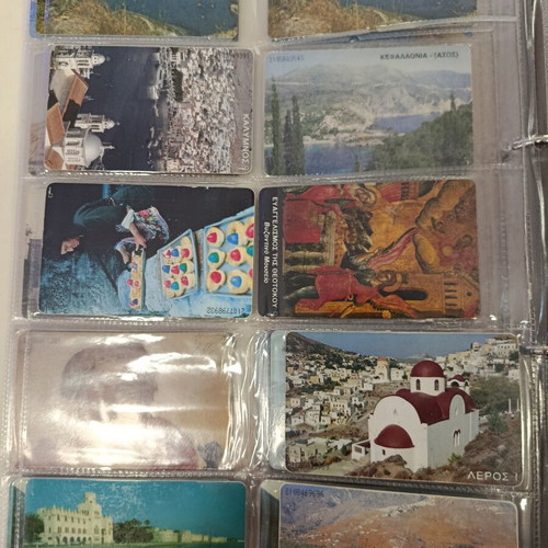 Album with approximately 170 used Greek phone cards