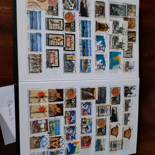 Various stamps used in 3 albums