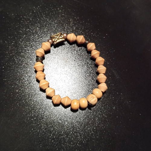 Unisex bracelet like new with elastic cord and wooden and metal beads