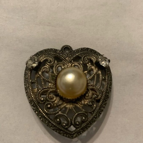 Old brooch used