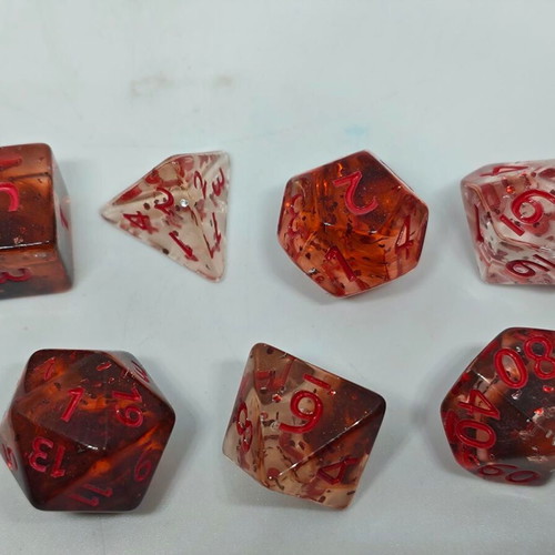 RPG Blood Amber dice set like new with unique effect, 7 pieces