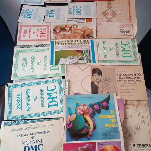 DMC and Burda embroidery patterns used, assorted