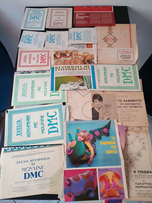 DMC and Burda embroidery patterns used, assorted