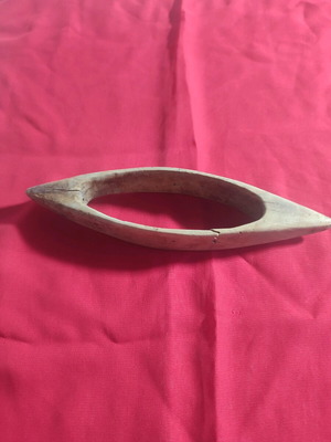 Weaving shuttle used, very old with crack