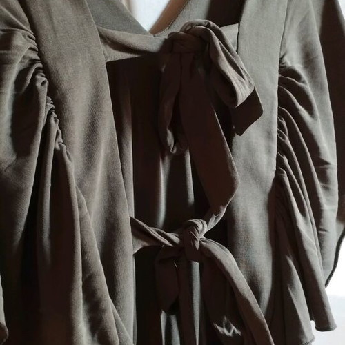 Innocent gray dress like new with unique back and ruffle sleeves