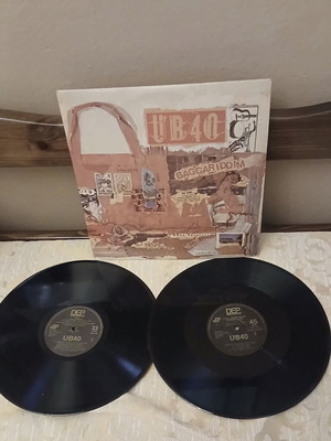 UB40 Baggariddim LP and 12" EP like new, reggae