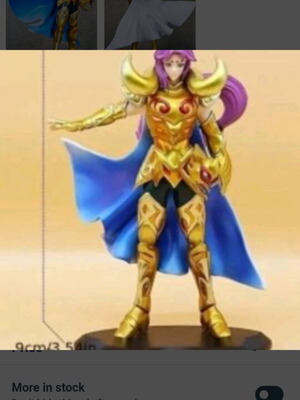 Saint Seiya Mu of Aries figure with golden armor and blue cape