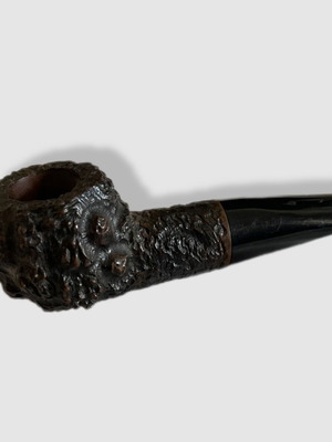Handmade Czech wooden smoking pipe used with signs of wear