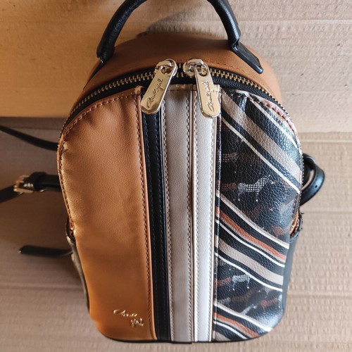 Axel girl backpack bag used, tan and black