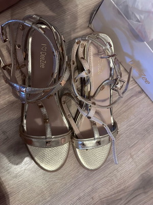 Gold sandals new with studs, size 39