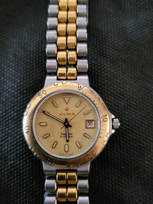 Olma Sapphire Seven Seas wristwatch like new, Swiss made