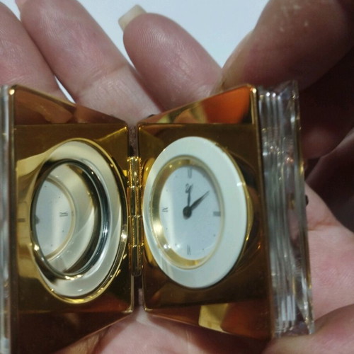 Swarovski book and clock like new with strap wear