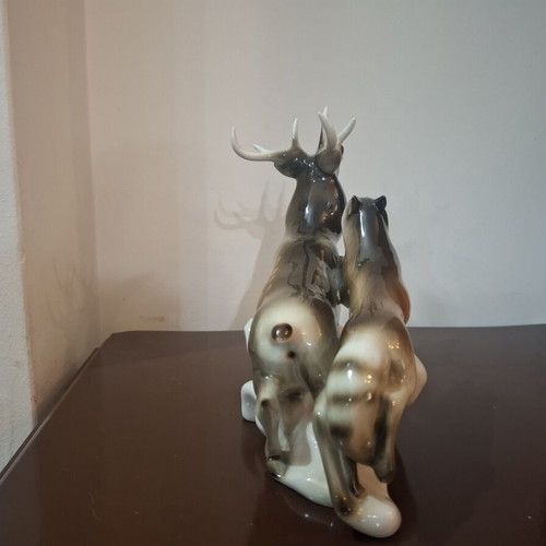 Royal Dux Bohemia porcelain figurine like new, deer and wolf scene
