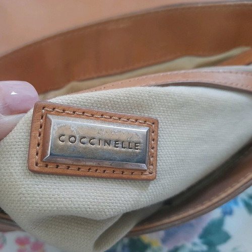 Coccinelle crossbody bag like new, tan color