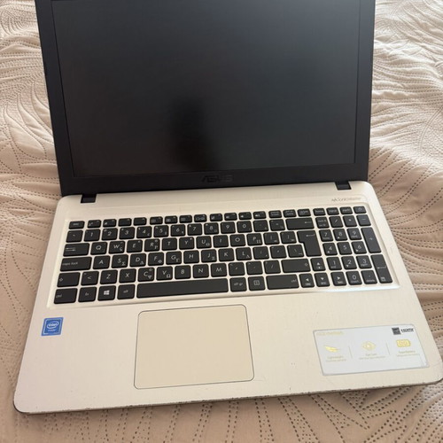 Asus VivoBook laptop with new charger, 15-inch, Intel Celeron, 4GB RAM