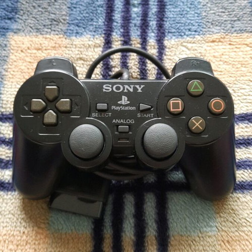 PlayStation 2 original controller used with good analog sticks
