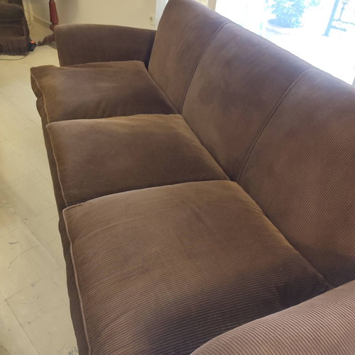 Handmade sofa used with brown velvet upholstery and walnut legs
