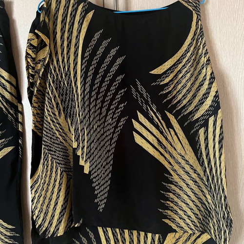 Set palazzo pants and asymmetric top used, size S-M