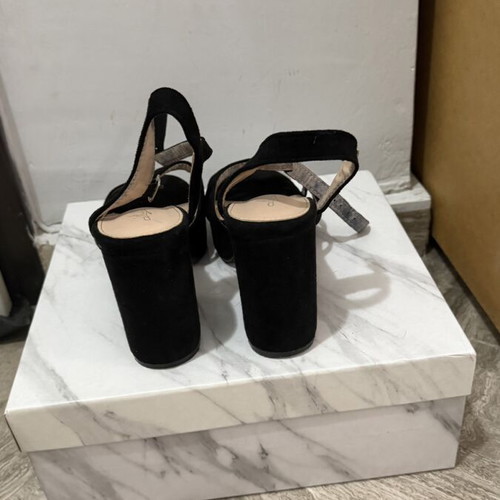 Black sandals used, 10 cm heel, size 37