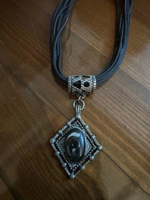 Necklace in like new condition, black and gray