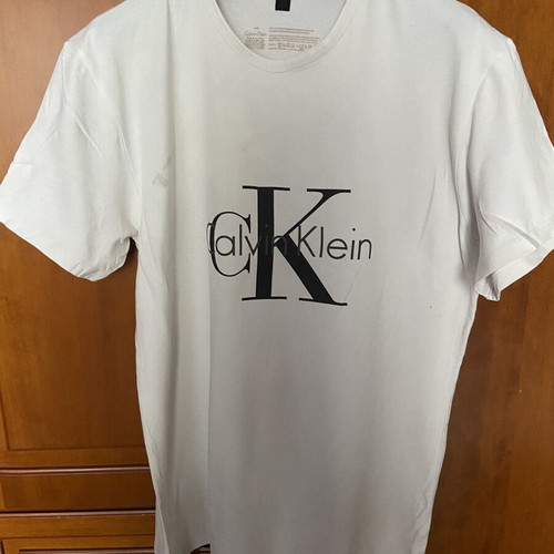 Calvin Klein men's t-shirt used, size M, with stain