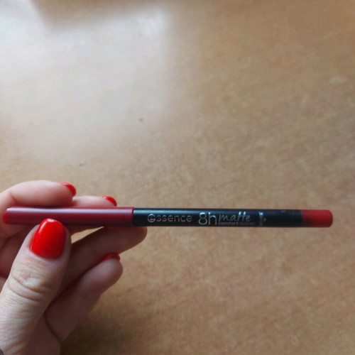 Mechanical lip pencil used, deep red with sharpener