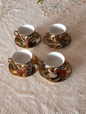 Coffee cups used, set of 4 with traditional designs