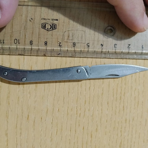 Folding knife small used with light wear