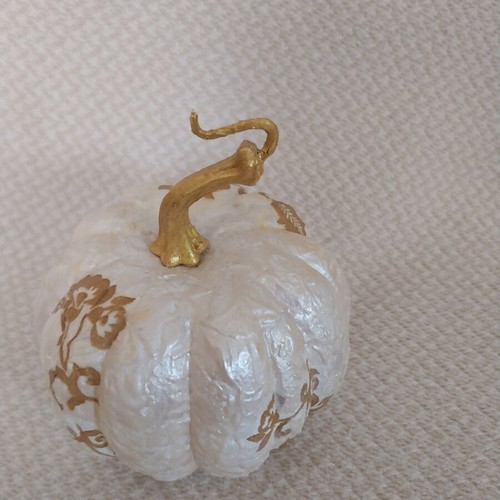 Handmade decorative pumpkin made of polystyrene with decoupage technique