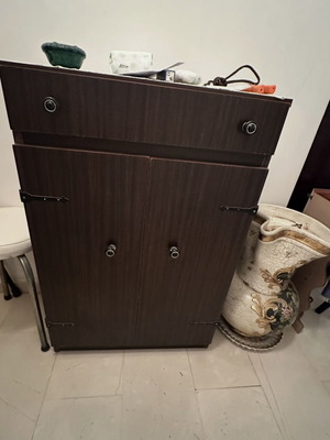 Dark cabinet with 2 doors and drawer