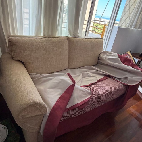 Living room set with beige three-seater and two-seater sofa, 2 stools