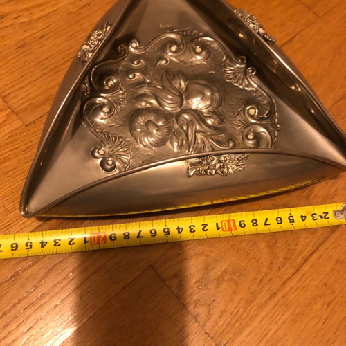 Decorative triangular vessel used with embossed flowers