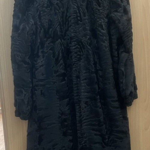 Astrakhan fur coat with mink collar