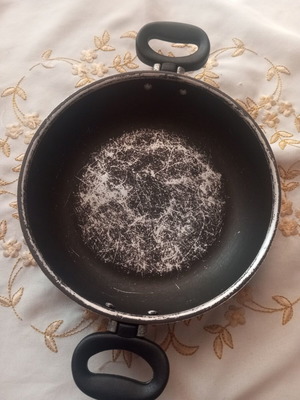 Small frying pan with handles, worn