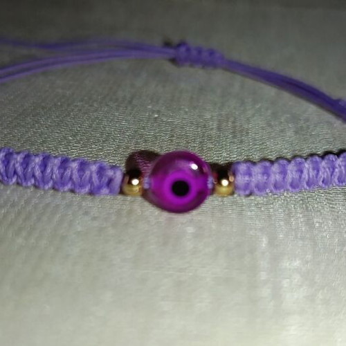 Woven bracelet with eye bead in lilac and fuchsia, new